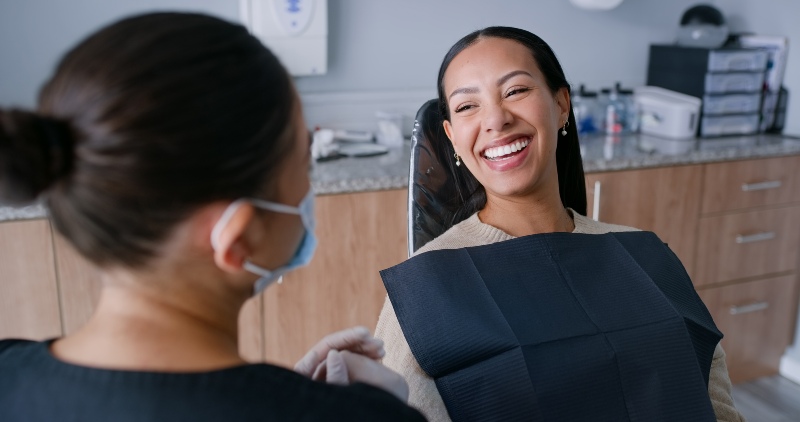 Woman happy with the restorative dental care received at Community Shores Dental in Norton Shores